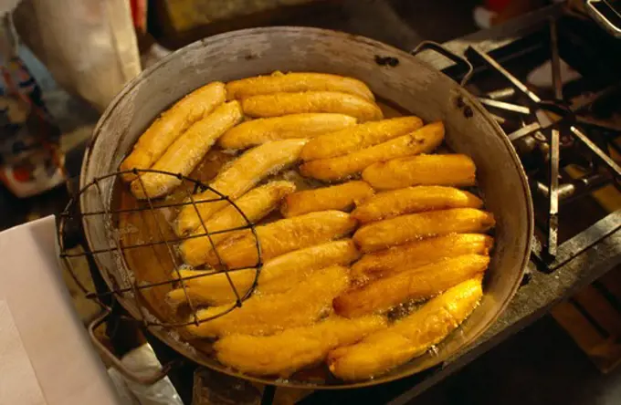 Mexico, Mexico City, Fried Bananas For Sale On Market Stall.