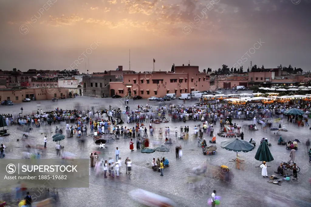 Morocco, , Marrakesh, Djemma el Fna market at dusk