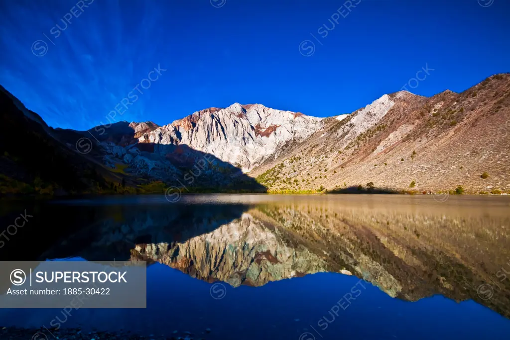 Reflection of Laurel Mountain and Sevehah Cliff Surrounded by Fall Color on Convict Lake, Mammoth Lakes, California, USA