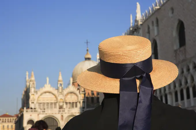 Italy, Veneto, Venice, Gondolier and Palazzo Ducale