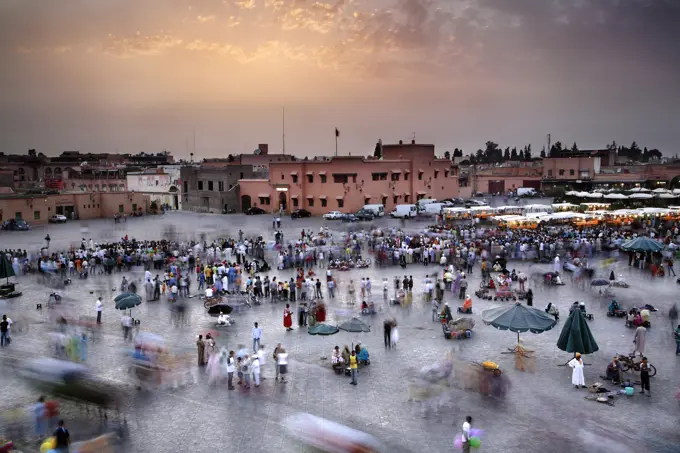 Morocco, , Marrakesh, Djemma el Fna market at dusk