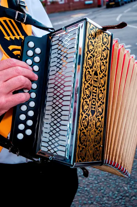 Piano accordion made by Hohner played by Morris dancer, Southampton, England