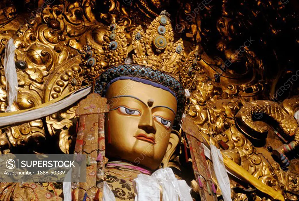 Jewel-encrusted statue of Maitreya (future Buddha) in the Main Assembly Hall at Drepung Monastery, Tibet.