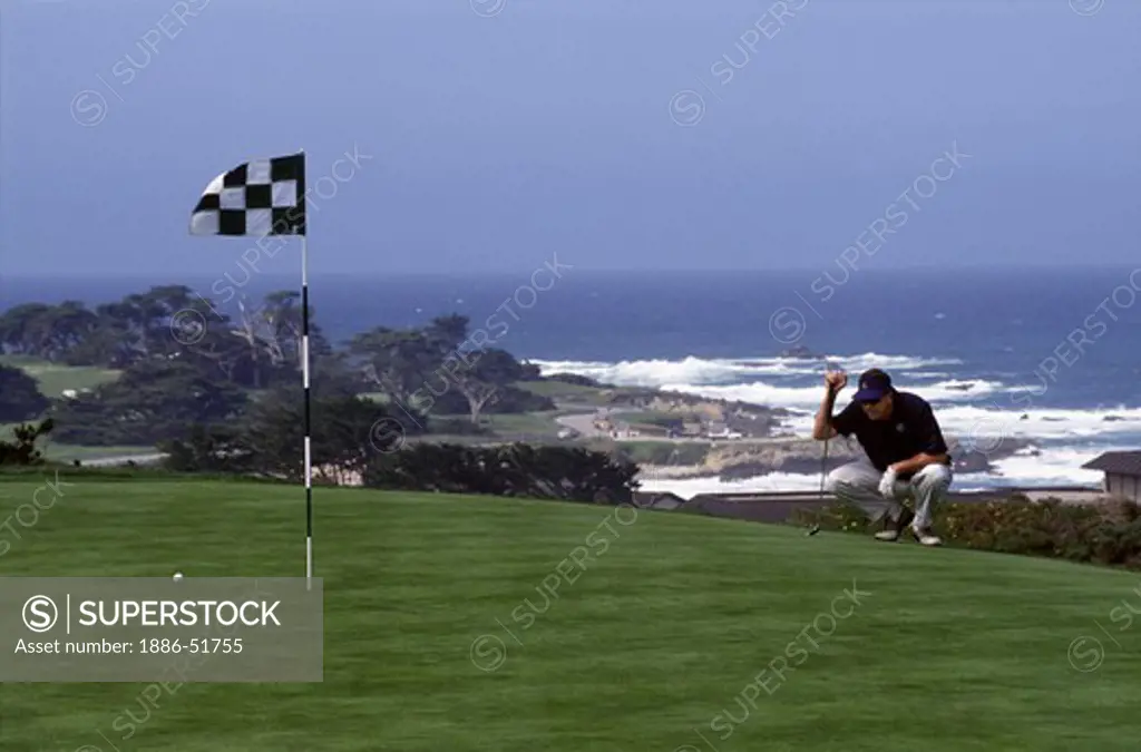 PUTTING on the GREEN of the SECOND HOLE of SPYGLASS Golf Course at PEBBLE BEACH on the MONTEREY PENINSULA