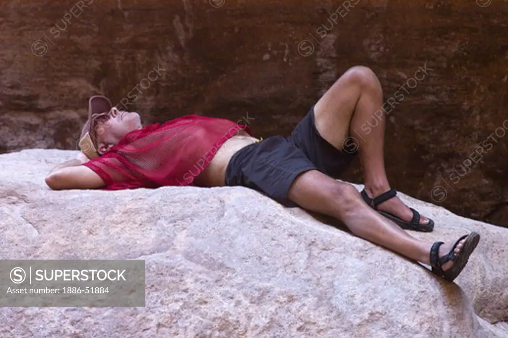 Greg Voelm in the slot canyon of BLACK TAIL CANYON NARROWS - GRAND CANYON NATIONAL PARK, ARIZONA