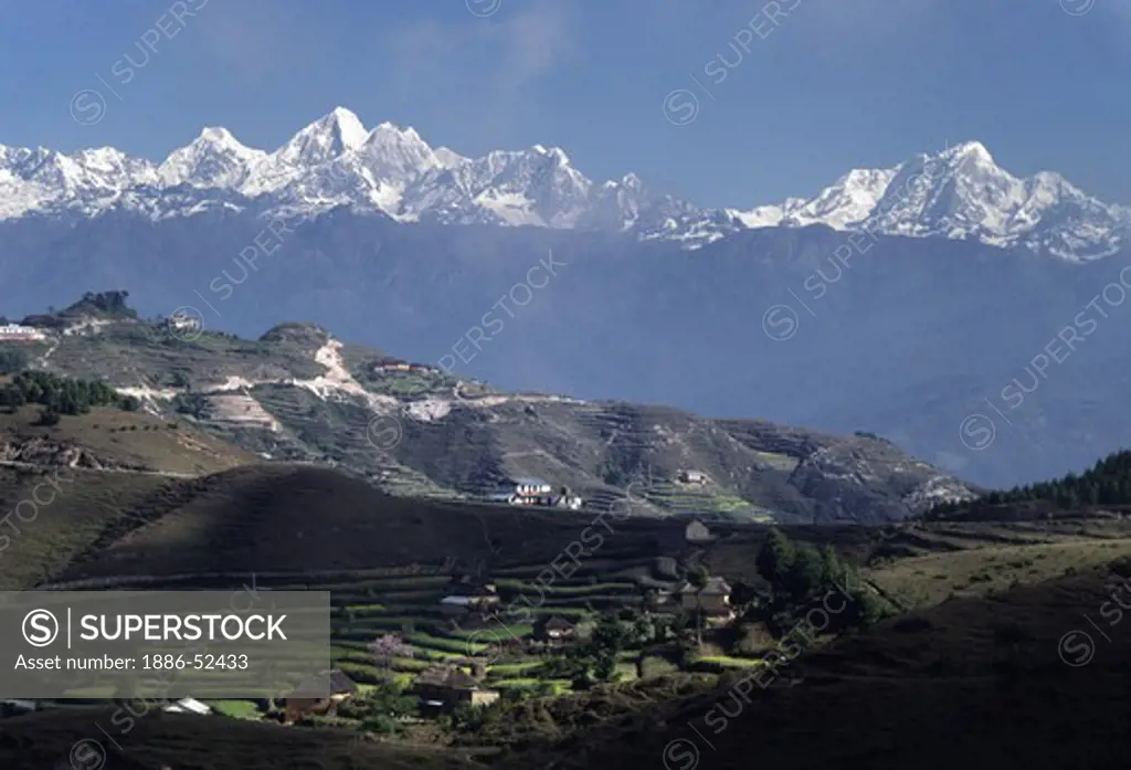 Nepal's middle hills with Mount Dorje Lakpa rising to 6989 meters and Phurba Chachu at 6658 meters  in the background