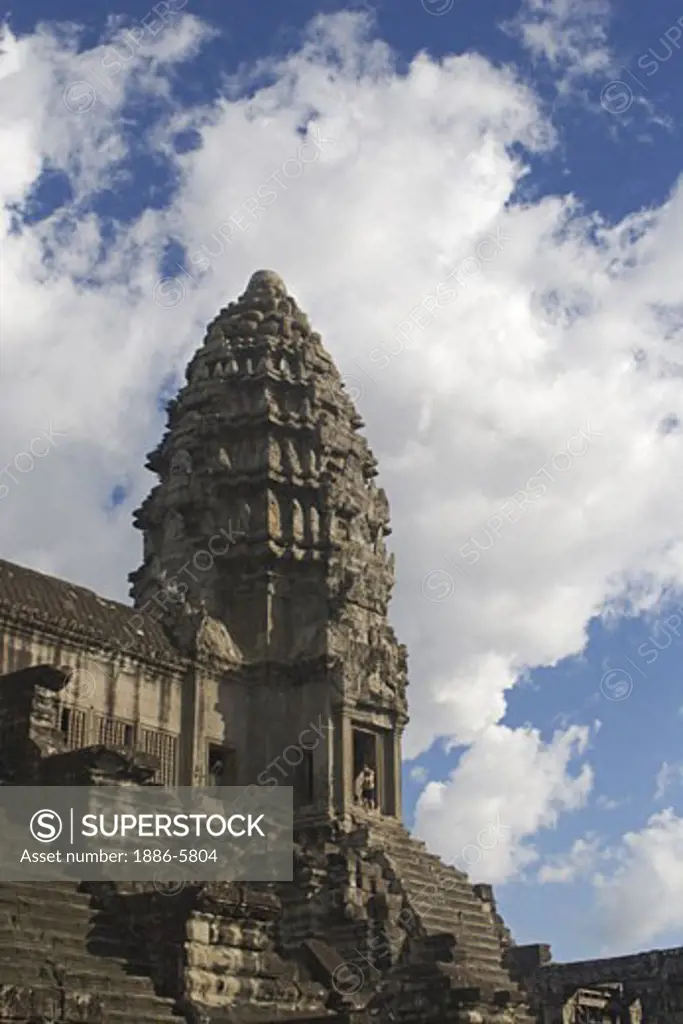 Stone temple representing one of the five peaks of Mount Meru at Angkor Wat, built in the 11th century by Suryavarman the 2nd  -  Cambodia   