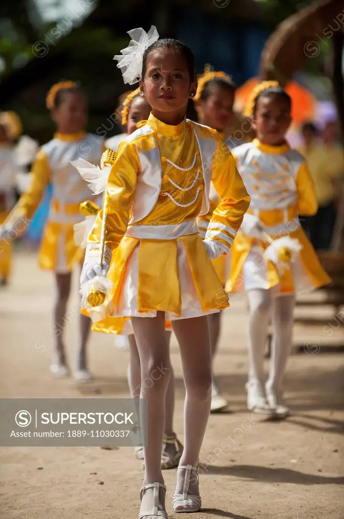 Young girls dance for street fiesta; General Luna, Siargao Island, Philippines