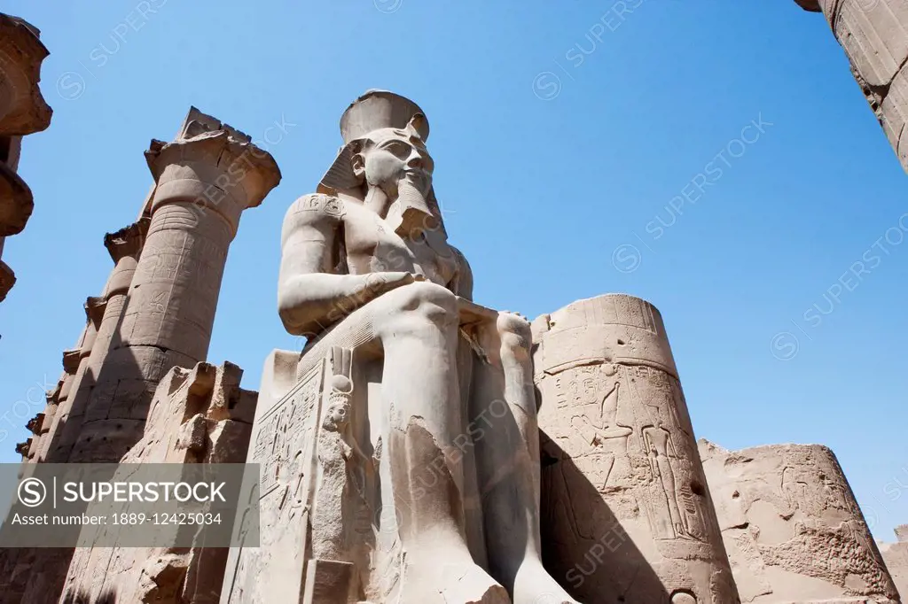 Colossal Statue Of Statue Of Ramses Ii And Queen Nefertari In The Courtyard Of Ramses Ii The Luxor Temple, Qina, Egypt