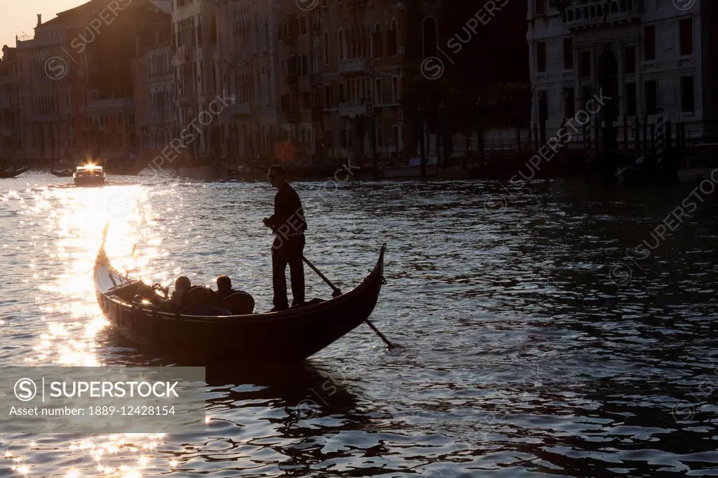 Gondoliero Rowing A Gondola, Venice, Italy