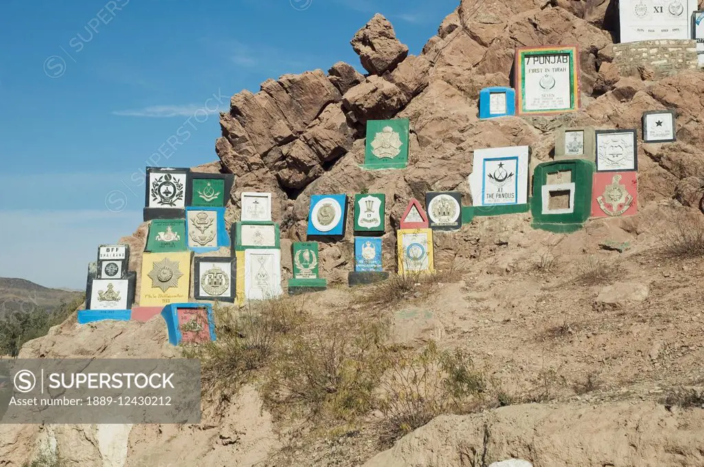 British Indian Regimental Badges Carved Into The Rock Face, Khyber Pass, Federally Administered Tribal Areas, Pakistan