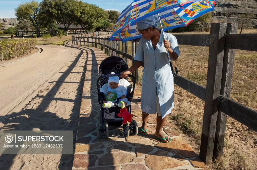 Baby In A Stroller Near Ranohira, Fianarantsoa Province, Madagascar