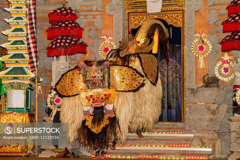 Barong, a mythical lion-like creature in a Barong dance performance by the Raja Peni troupe in the evening, Ubud, Bali, Indonesia