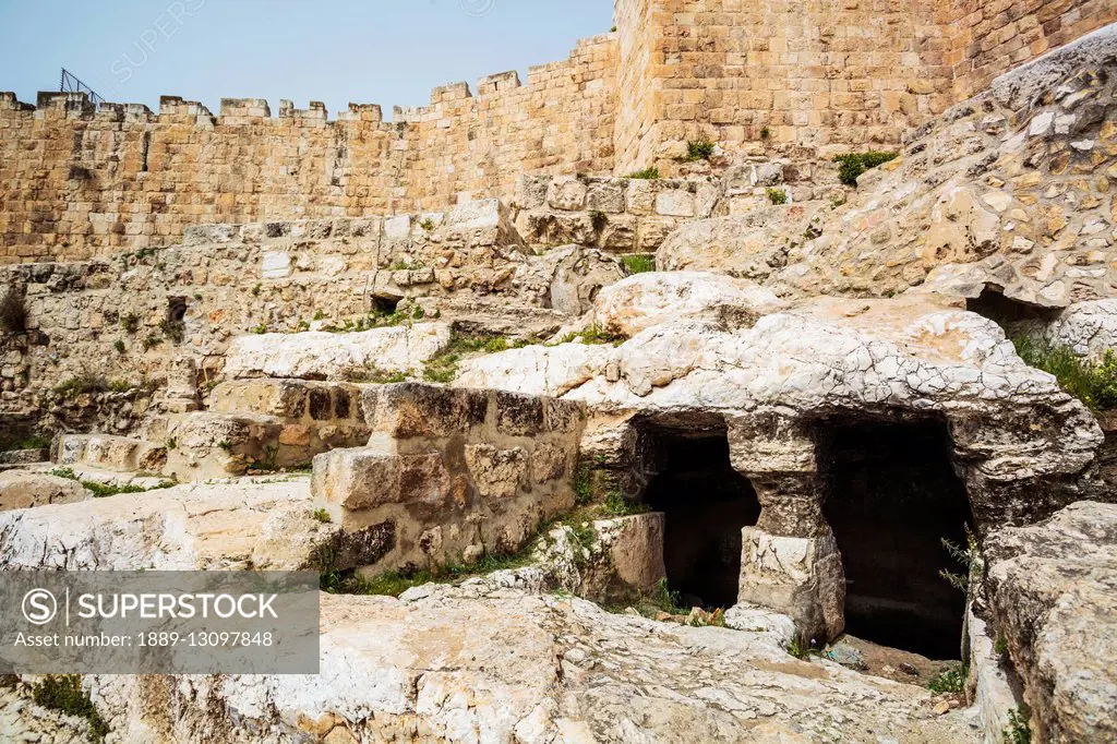 Historic ruins with a large wall and cave; Jerusalem, Israel