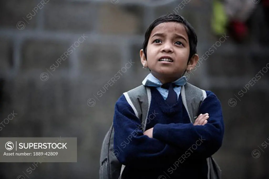 Pokhara, Nepal; Orphaned boy in school uniform