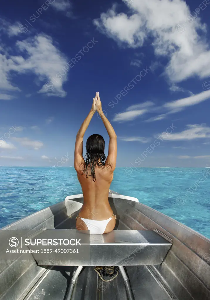 French Polynesia, Tahiti, Bora Bora, Woman Sitting In Boat.