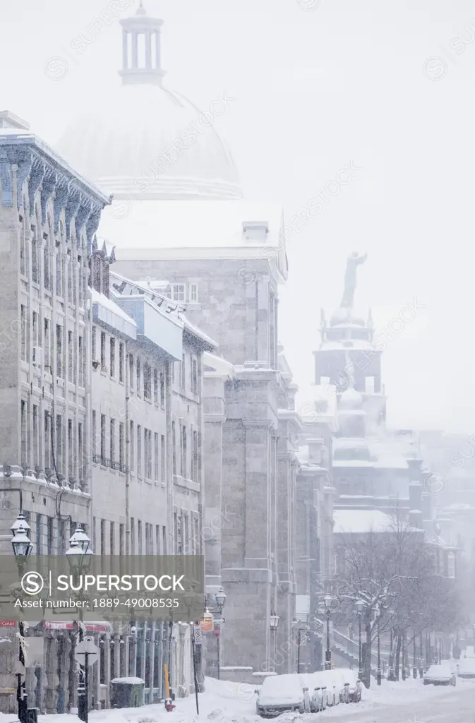 Snow-Covered De La Commune Street In Old Montreal; Montreal Quebec Canada