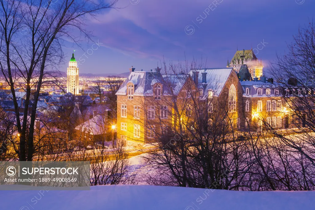 Saint-Denis Street And Chateau Frontenac At Dusk In Winter; Quebec City Quebec Canada