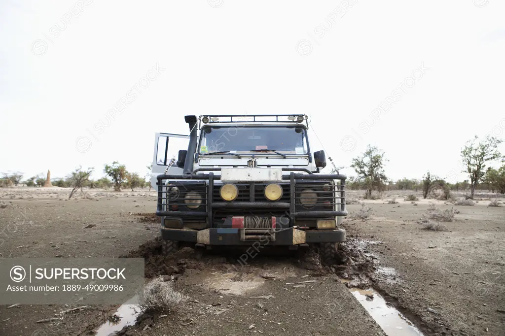 Kenya, Front view of Landrover in mud; North Turkana