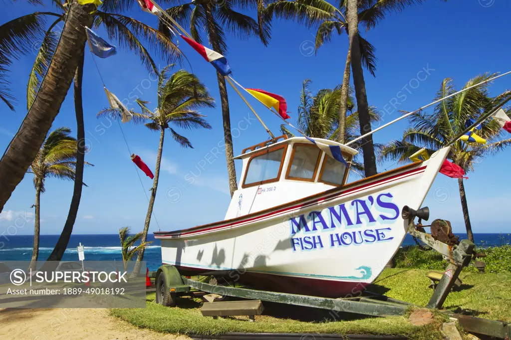 Hawaii, Maui, A Fishing Boat In Front Of Mama's Fish House Restaurant On The North Shore. Editorial Use Only.