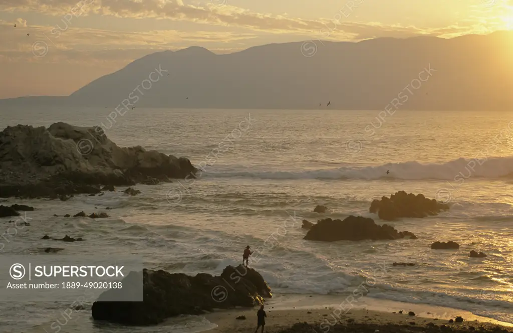 Fishermen cast their lines into the surf near Antofagasta, Chile; Chile