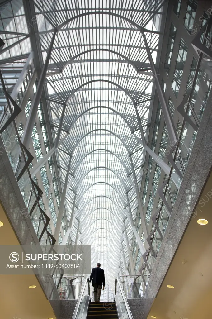 Man At The Top Of An Escalator, Brookfield Place, Toronto, Ontario