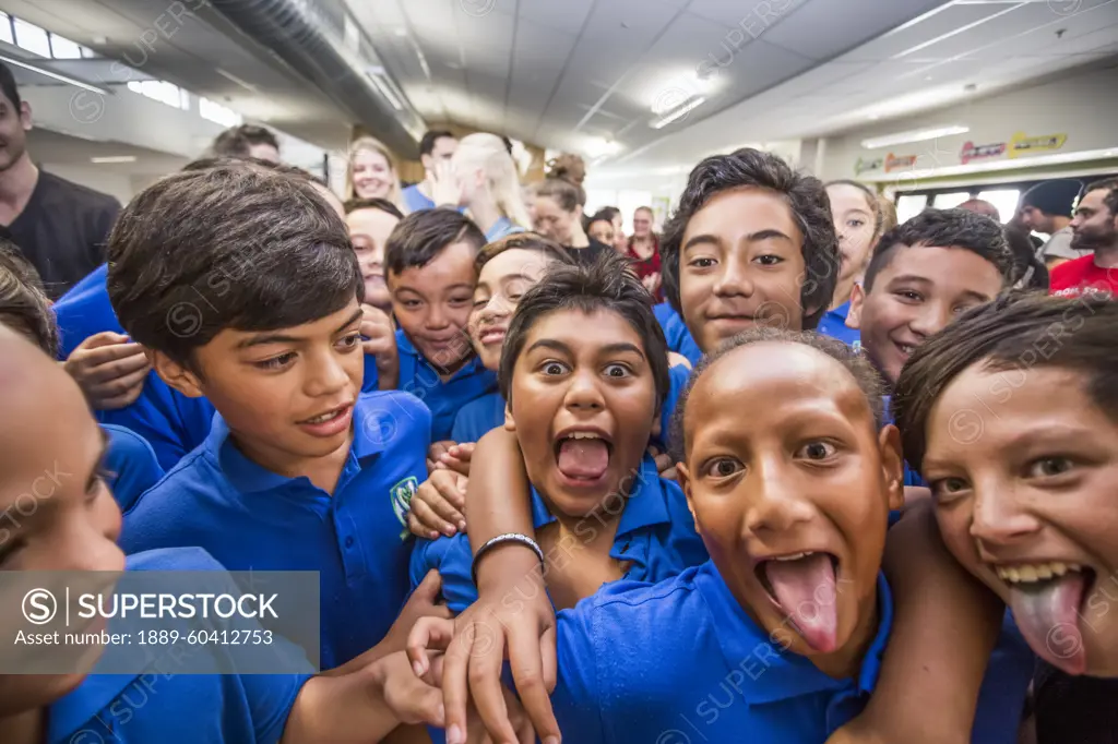 A goofy photo with local Maori schoolchildren in Galatea, New Zealand; Marupara, Bay Of Plenty, New Zealand