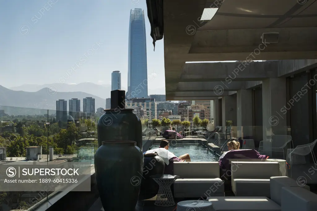 Hotel with rooftop pool and a view of the Great Santiago Tower; Santiago de Chile, Chile