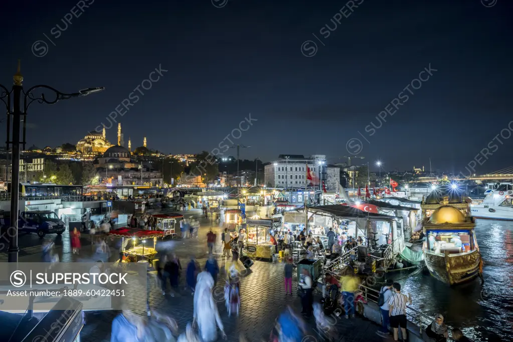 Eminonu Square and Suleymaniye Mosque at night in Istanbul; Istanbul, Turkey