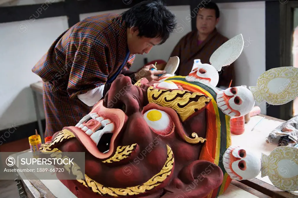 Art Student Working On Mask In National Institute Of Zorig Chusum, Thimphu Bhutan