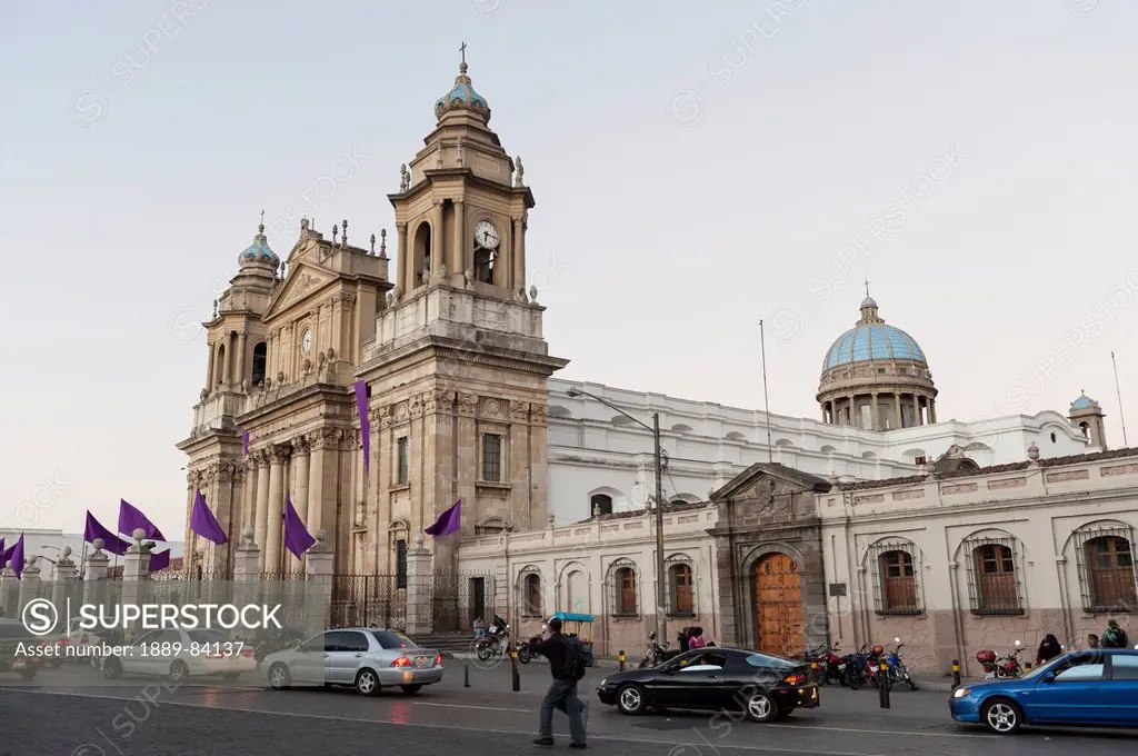 Traffic Lined Up On The Street Outside The Cathedral Of Guatemala City, Guatemala City Guatemala