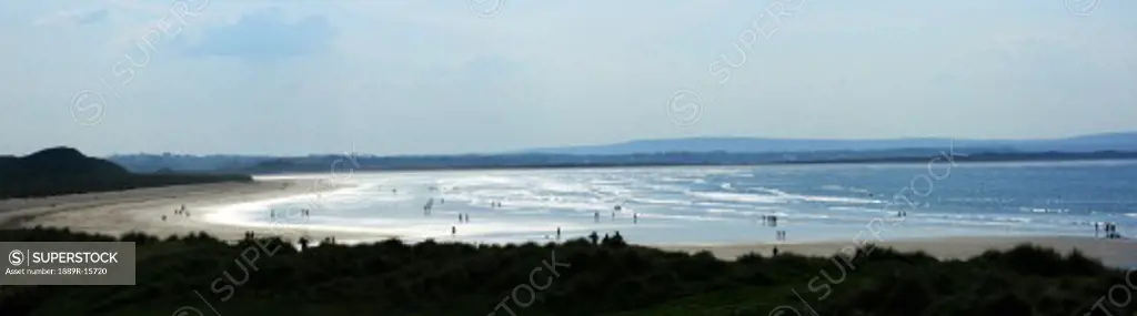 Co Sligo, Ireland; Enniscrone beach with Killala Village in background