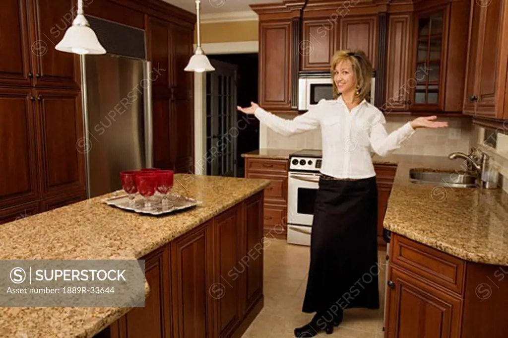 Hostess welcoming you to her kitchen