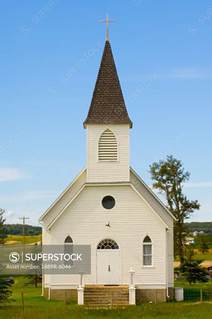 Little white traditional steeple church