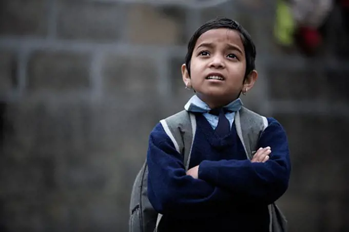 Pokhara, Nepal; Orphaned boy in school uniform