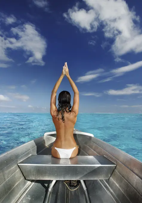 French Polynesia, Tahiti, Bora Bora, Woman Sitting In Boat.