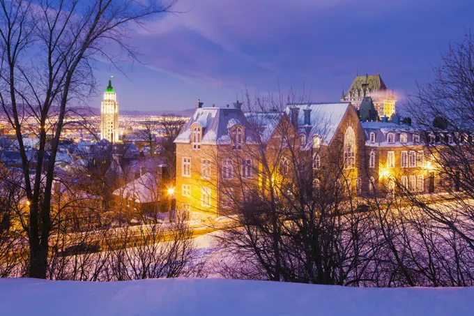 Saint-Denis Street And Chateau Frontenac At Dusk In Winter; Quebec City Quebec Canada