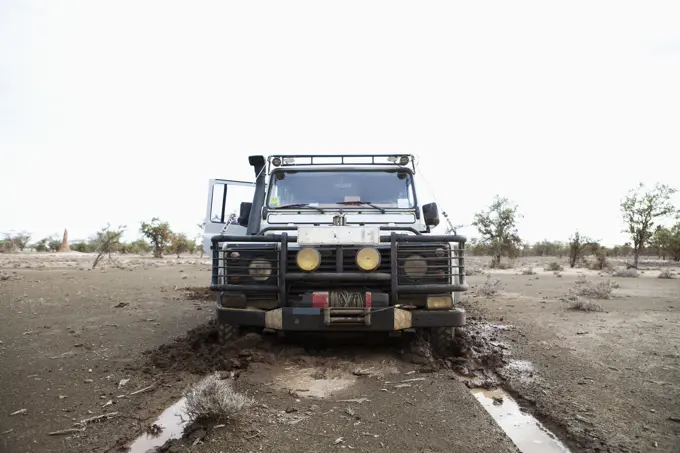 Kenya, Front view of Landrover in mud; North Turkana