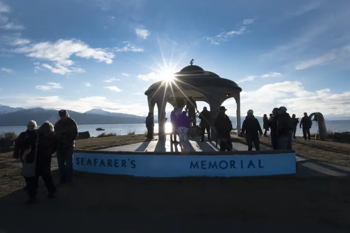 Tourists at the Seafarer's Memorial on the coast of Alaska; Homer, Alaska, United States of America