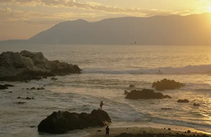 Fishermen cast their lines into the surf near Antofagasta, Chile; Chile