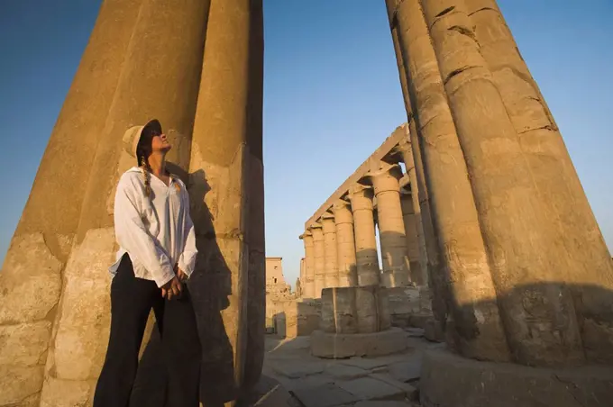 Woman tourist at the Temple of Luxor, Egypt