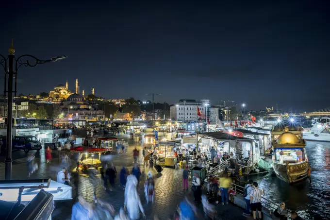 Eminonu Square and Suleymaniye Mosque at night in Istanbul; Istanbul, Turkey