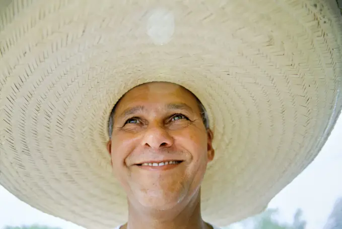 Brazilian man wearing a large brimmed hat; Pantanal Region, Brazil