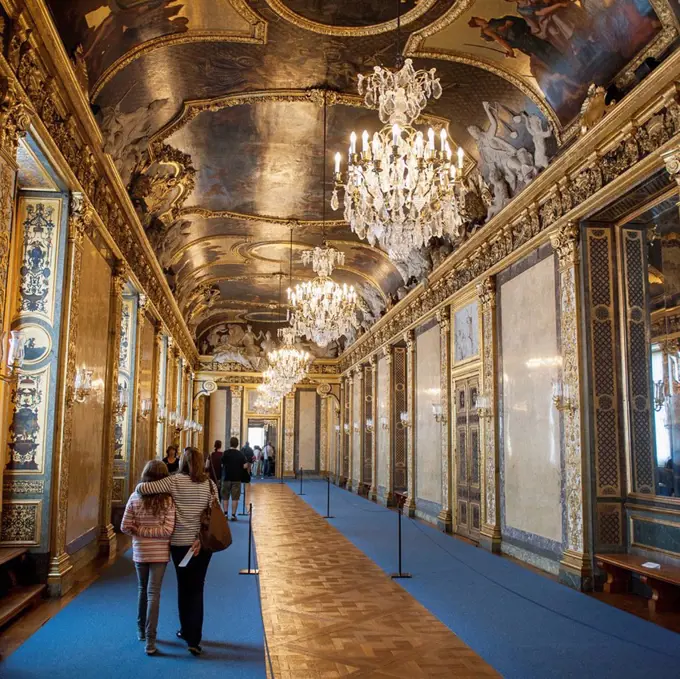 Tourists walking in a corridor of stockholm palace, stockholm sweden