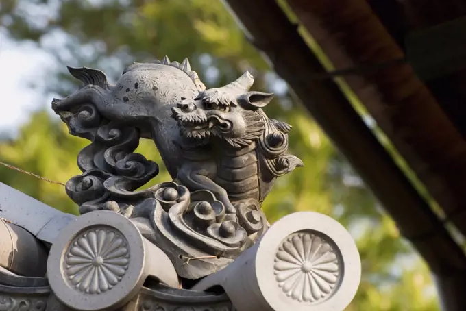 Japanese temple roof edge and gargoyle, kyoto, japan