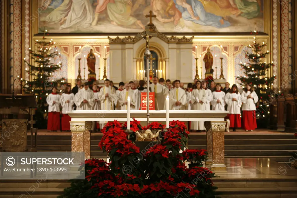 Christmas midnight Mass in Ludwigkirche, Munich, Bavaria, Germany, Europe