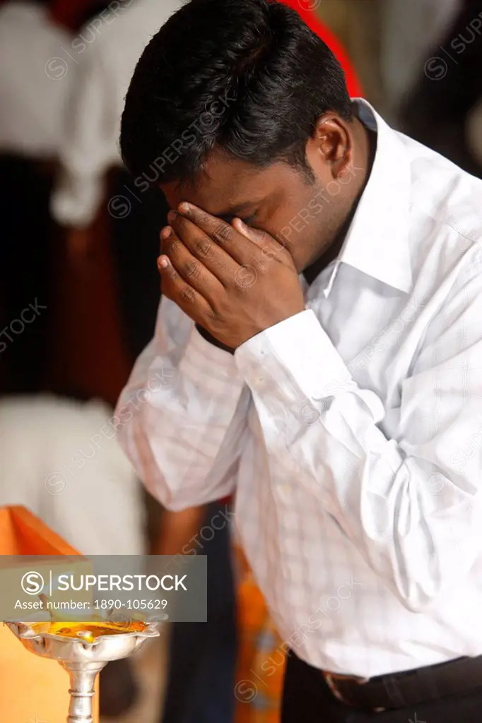 Prayer in Hindu temple, Dubai, United Arab Emirates, Middle East