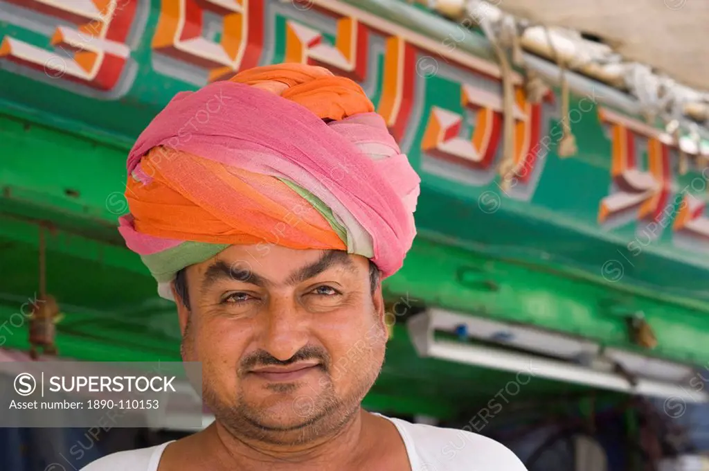 The owner of a turban shop outside his store in Jodhpur, Rajasthan, India, Asia
