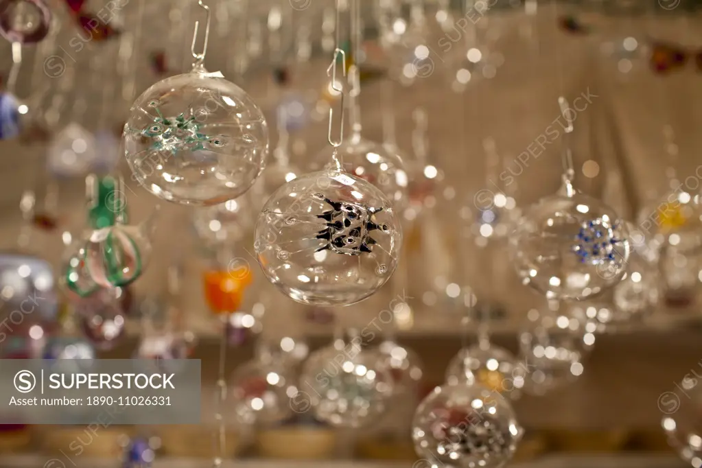 Christmas tree decorated glass baubles at Christmas market, Winter Wonderland, in Hyde Park, London