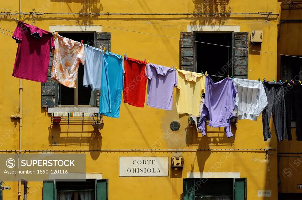 Clothes hanging on a washing line between houses, Venice, UNESCO World Heritage Site, Veneto, Italy, Europe